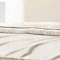 Letto a piattaforma imbottito con motivo a mattoni e letto estraibile Twin XL