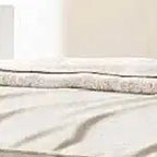 Letto a piattaforma imbottito con motivo a mattoni e letto estraibile Twin XL