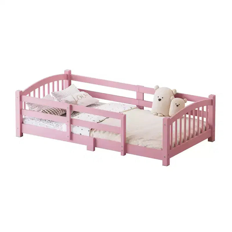 Letto a pavimento Montessori per bambini, una piazza, con doghe e sponde di protezione – Struttura letto in legno massiccio, rosa