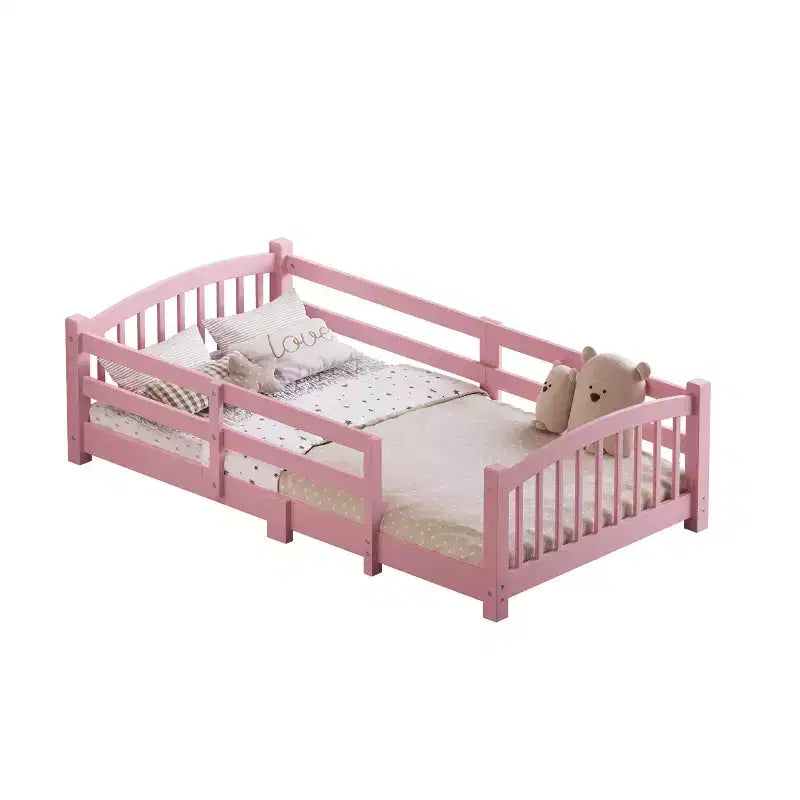 Letto a pavimento Montessori per bambini, una piazza, con doghe e sponde di protezione – Struttura letto in legno massiccio, rosa